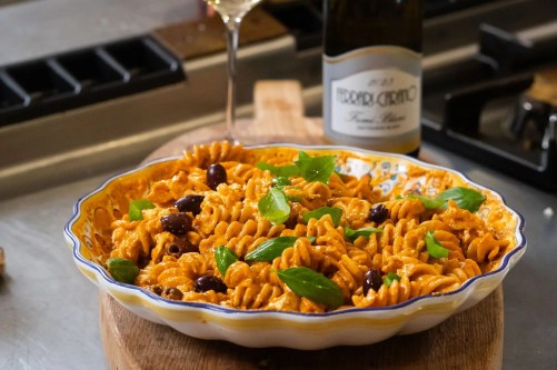 red pesto pasta salad with olives mozzarella paired with fume blanc